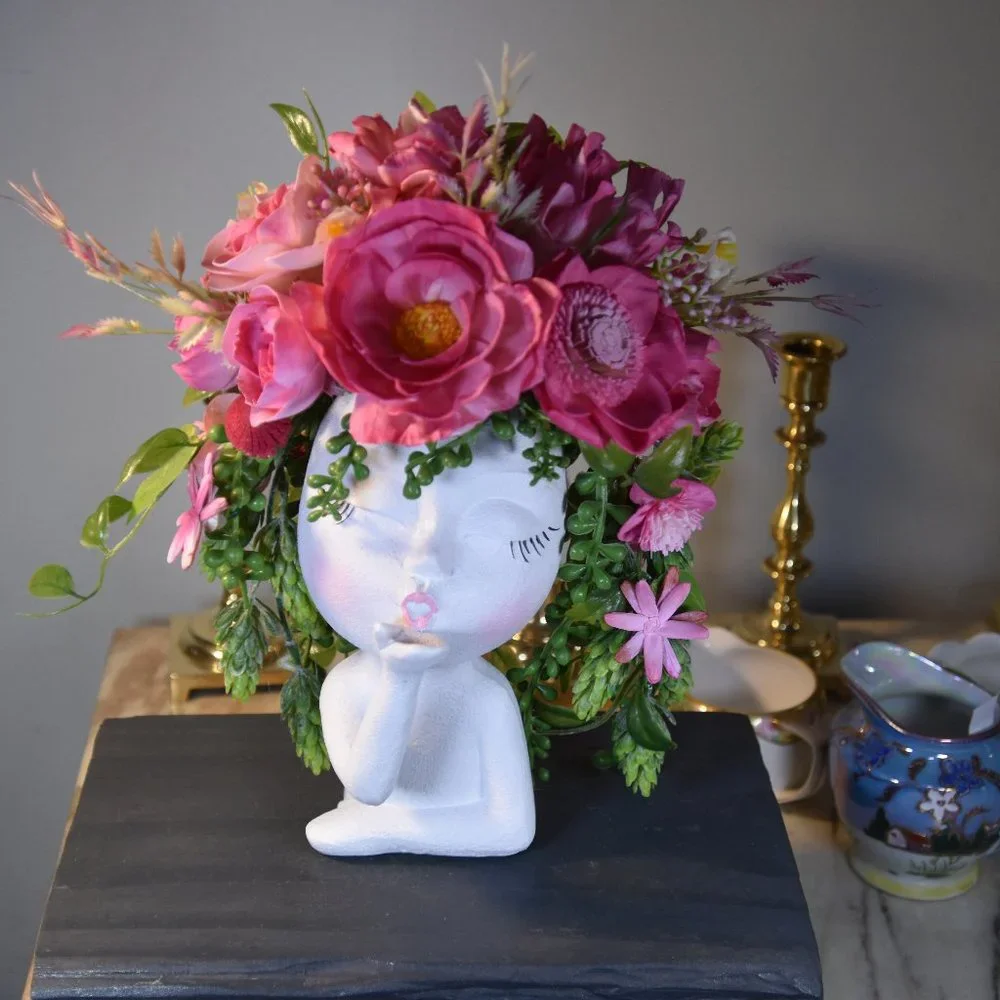Bright cheerful and fun! Girl blowing kisses planter/vase w/Sola wood flowers